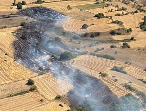 Balıkesir’de arazide çıkan yangına müdahale ediliyor