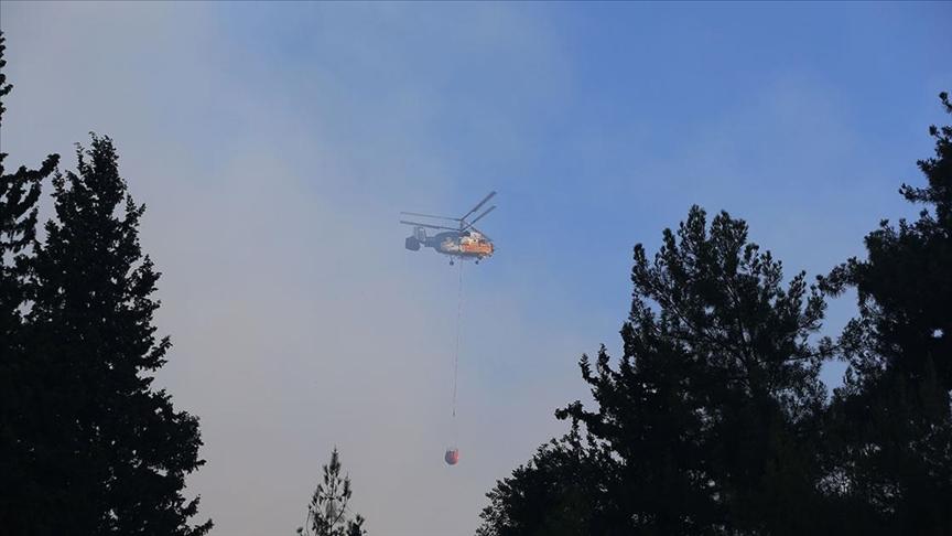 Hatay Dörtyol’da dün çıkan orman yangınına müdahale sürüyor